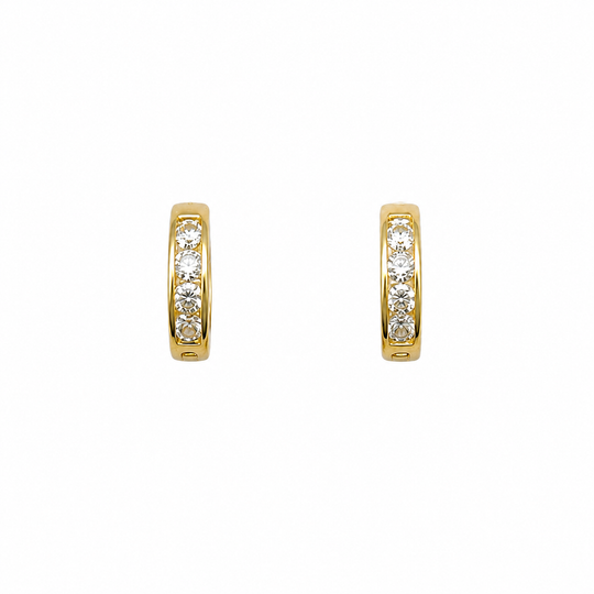 Pair of gold hoop earrings with embedded diamonds on a white background