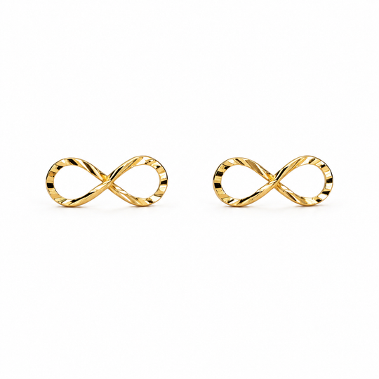 Gold infinity symbol earrings on a white background